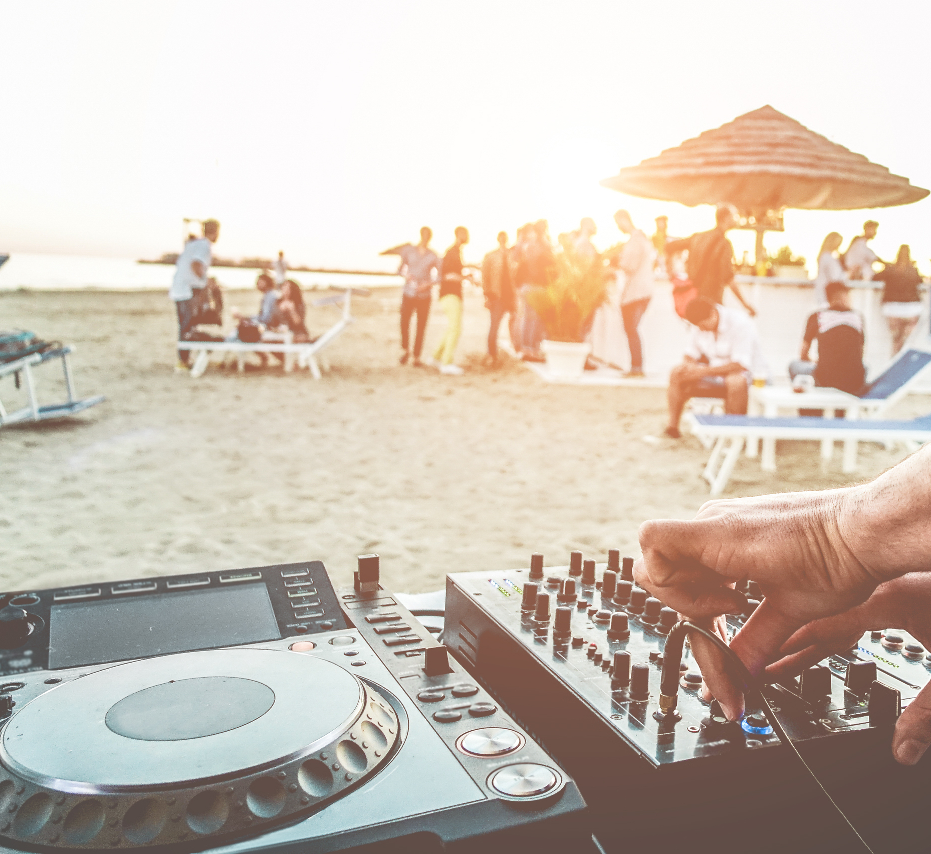 dj-mixing-at-sunset-beach-party-in-summer-vacation-2025-02-21-10-48-39-utc (1)
